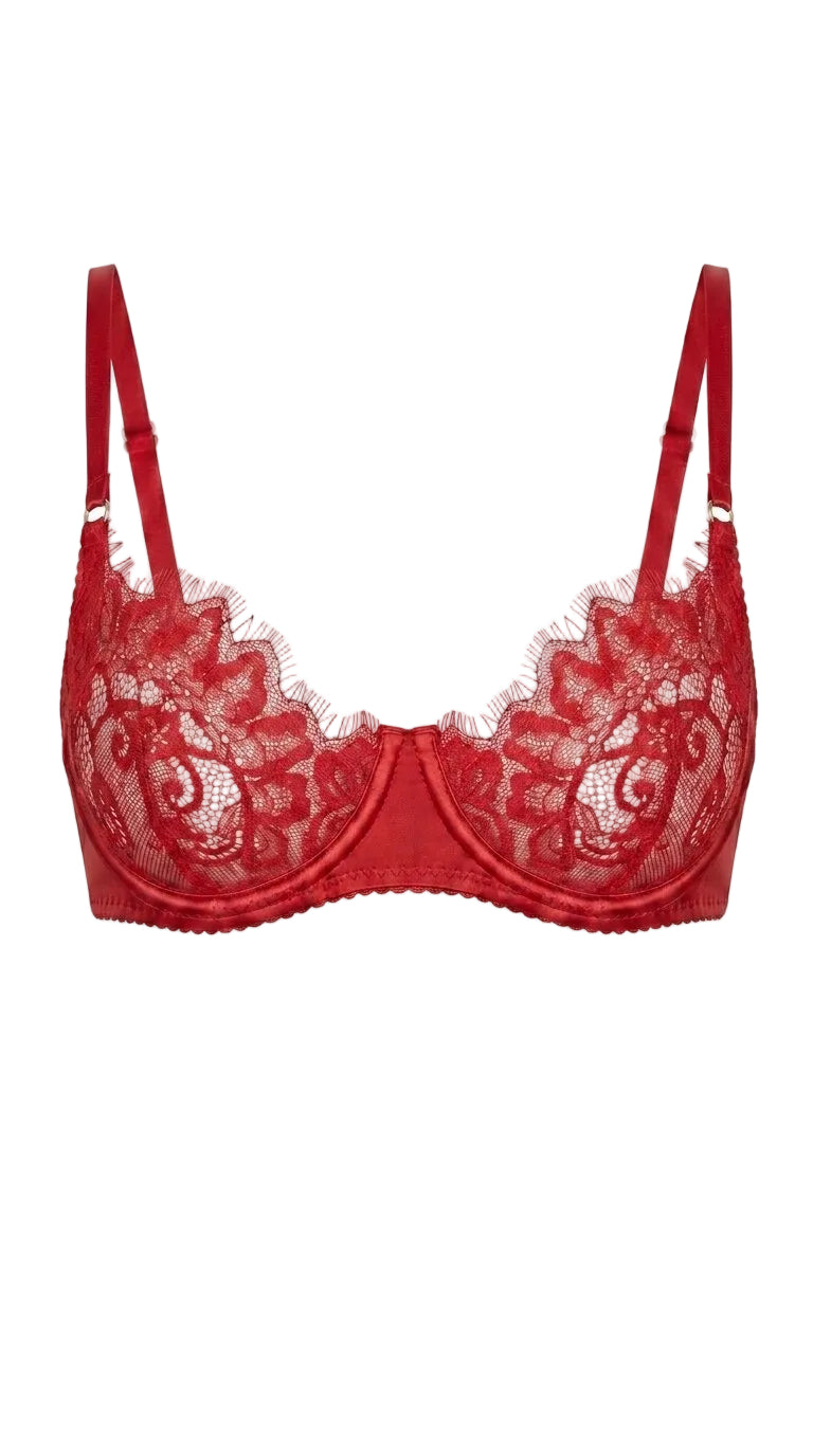 Product shot of the Bella red lace bra on a white background, featuring sheer lace cups and satin underwire trim.