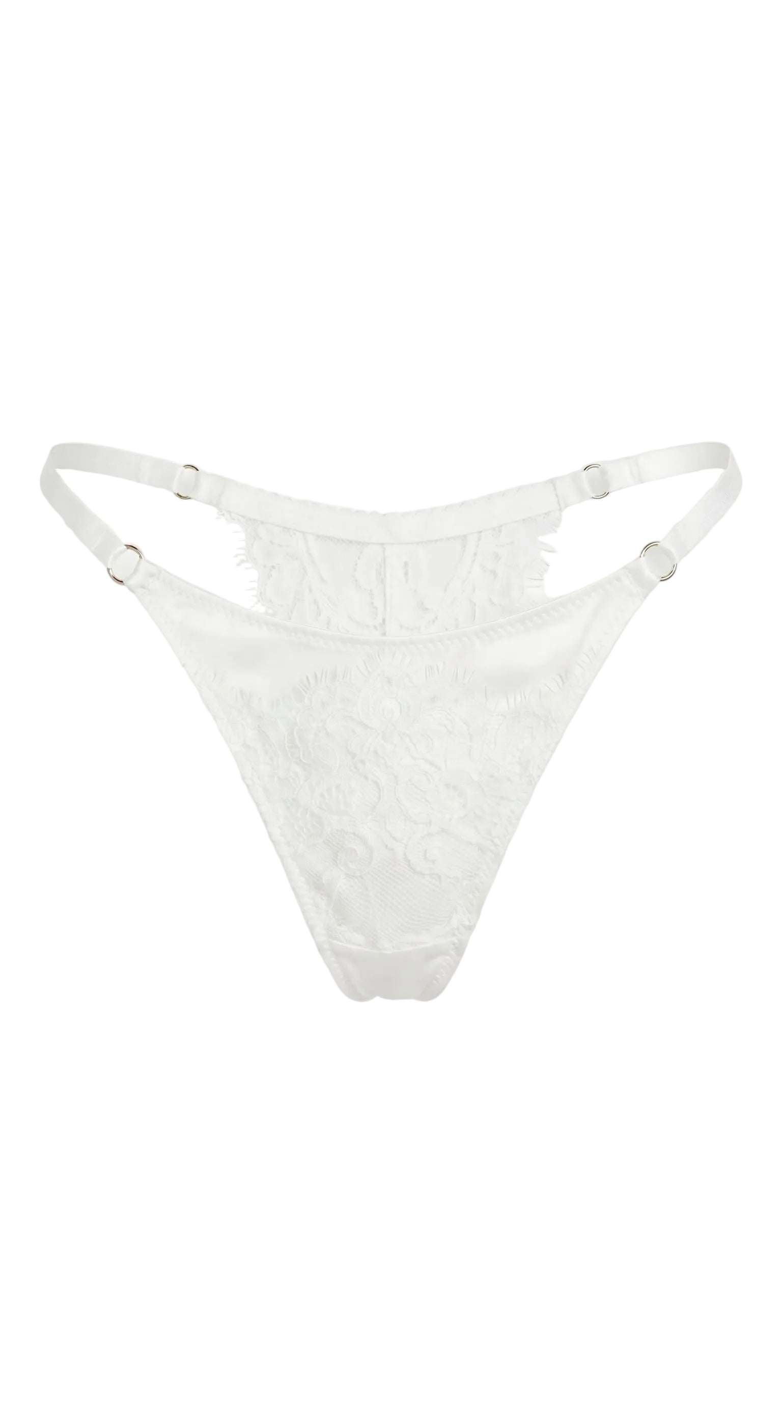Detailed view of artisanal white embroidery and translucent mesh on the Bella bridal set.