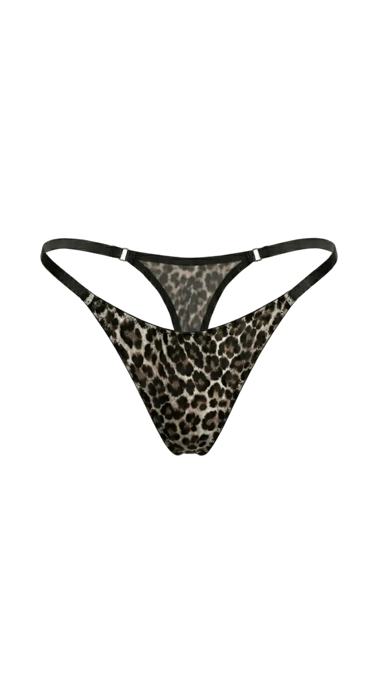 Detailed view of artisanal leopard mesh and sheer black lace on the Leo set.