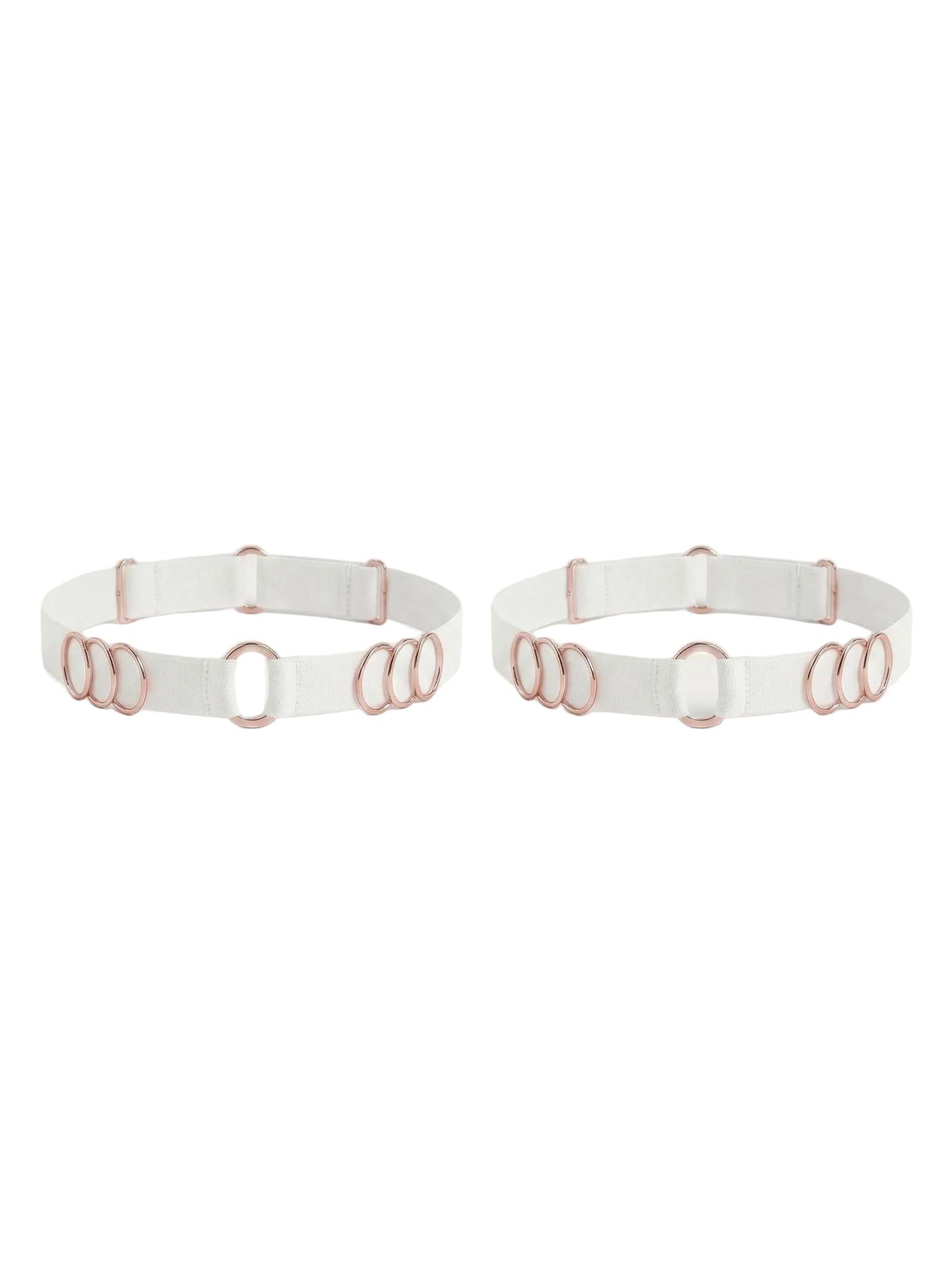 Handcrafted white leg garter featuring signature gold-plated rings.