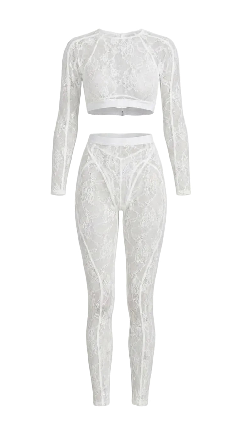 Bespoke white Sensual Edge lace suit with architectural open-back detail.