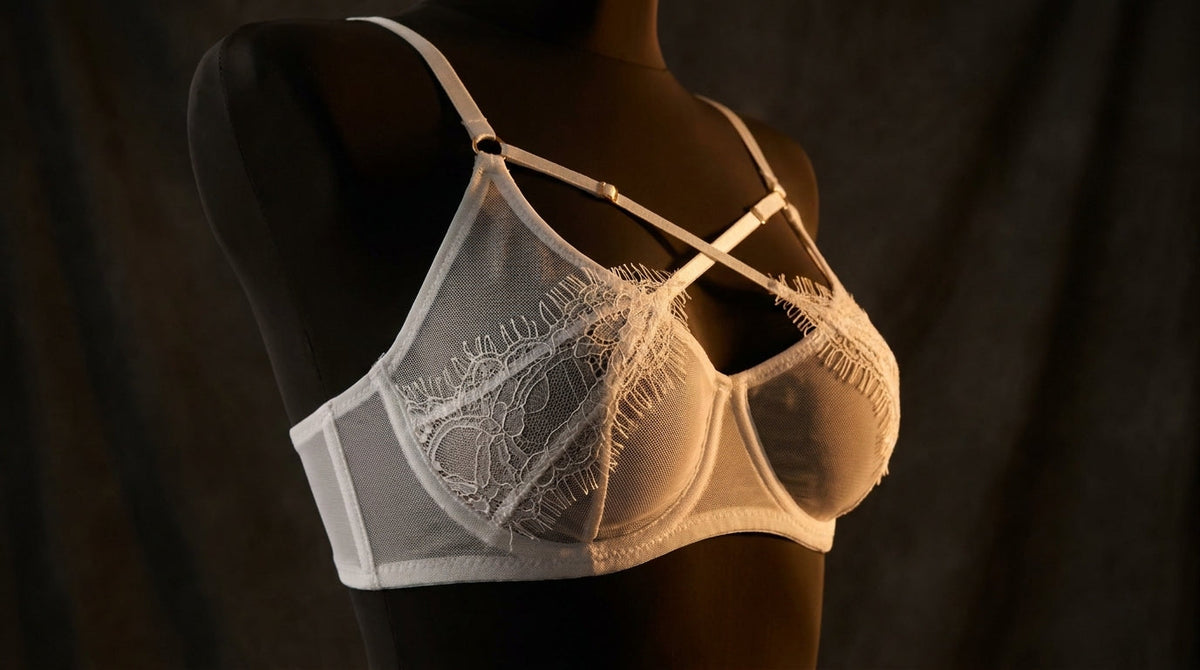 Three-quarter view of a structured lace bra and brief set showing boned cup construction.