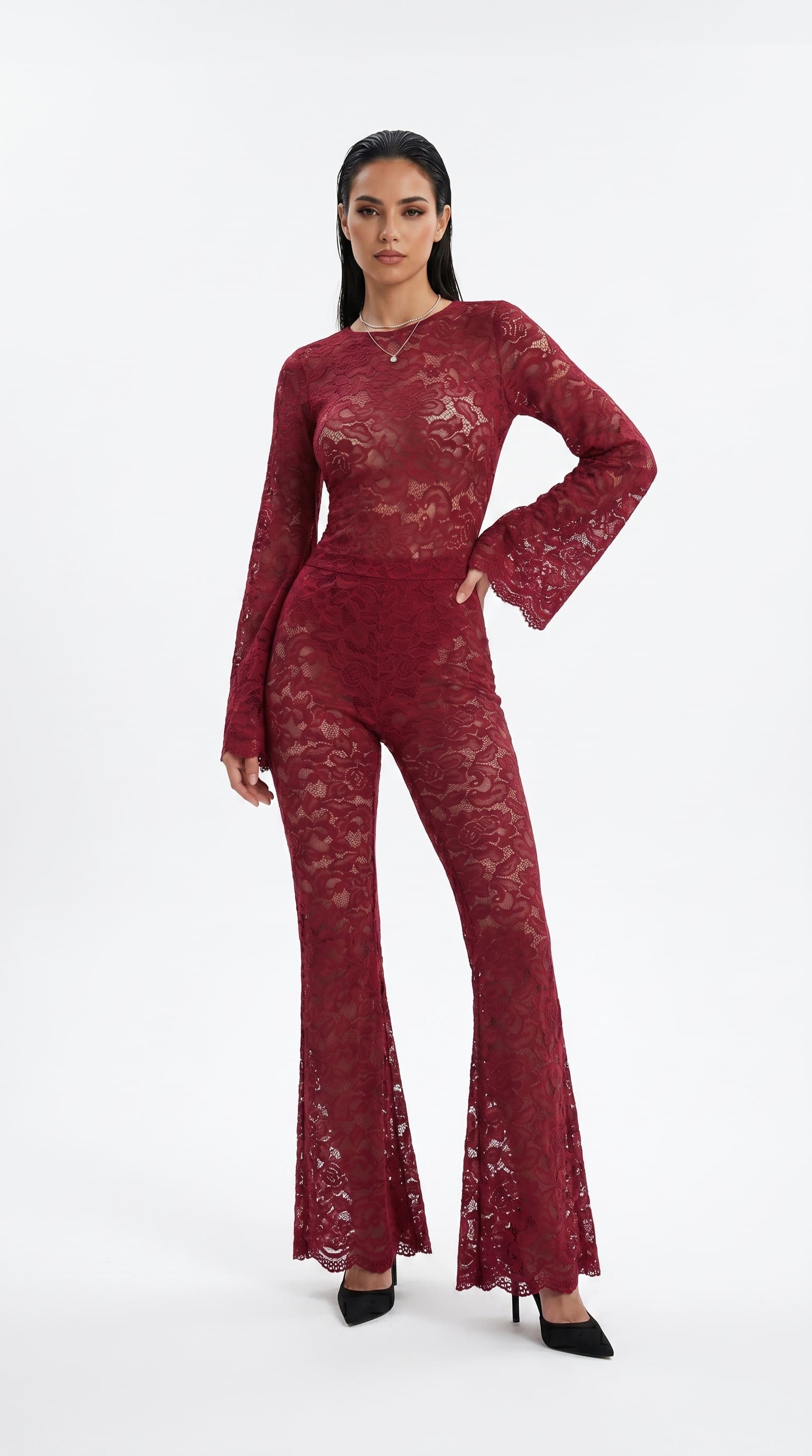 Front view of the Amalia burgundy lace catsuit, showing the long sleeves and flared leg silhouette.