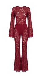 Regal red Amalia Empress lace suit with dramatic flared sleeves.