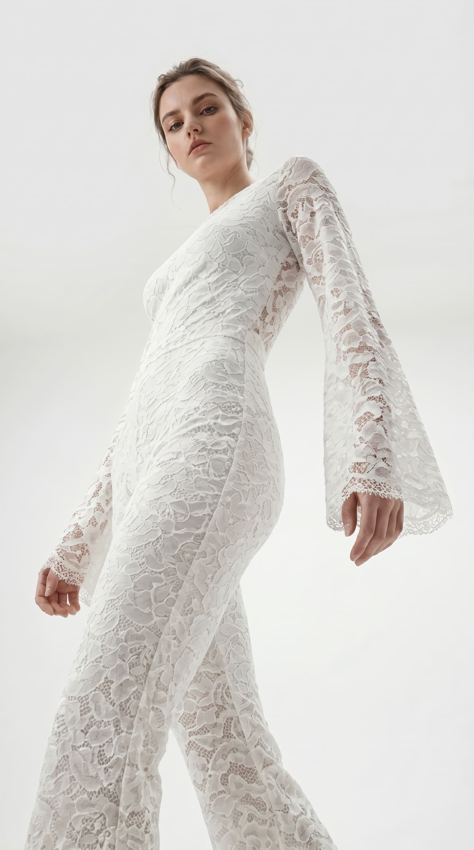Handcrafted white floral lace bodysuit from the Amalia Empress collection.