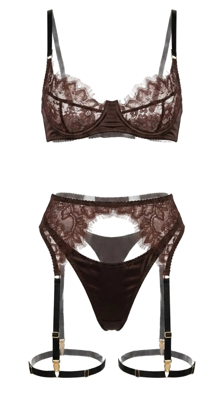 Product flat-lay of the Amber brown lace bra and garter belt set on a white background, showing the matching lace pattern and satin trim.