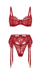 Flat-lay of the complete Ariana red lingerie set — floral lace bra, garter belt, and matching panties.