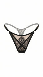 Detailed view of handcrafted noir embroidery and sheer mesh on the Black Swan set.