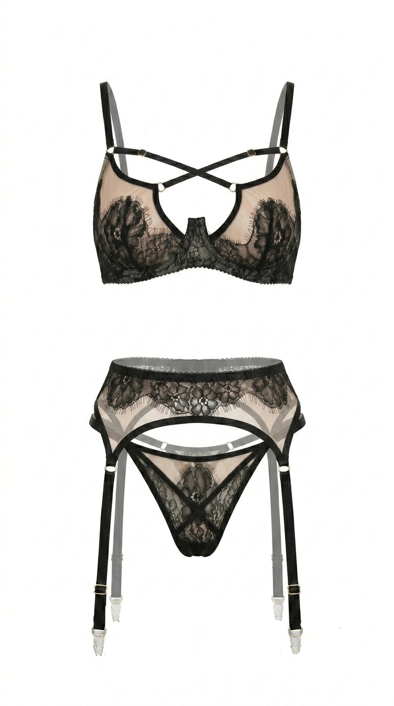 Dramatic Black Swan noir lace lingerie set with architectural mesh detailing.