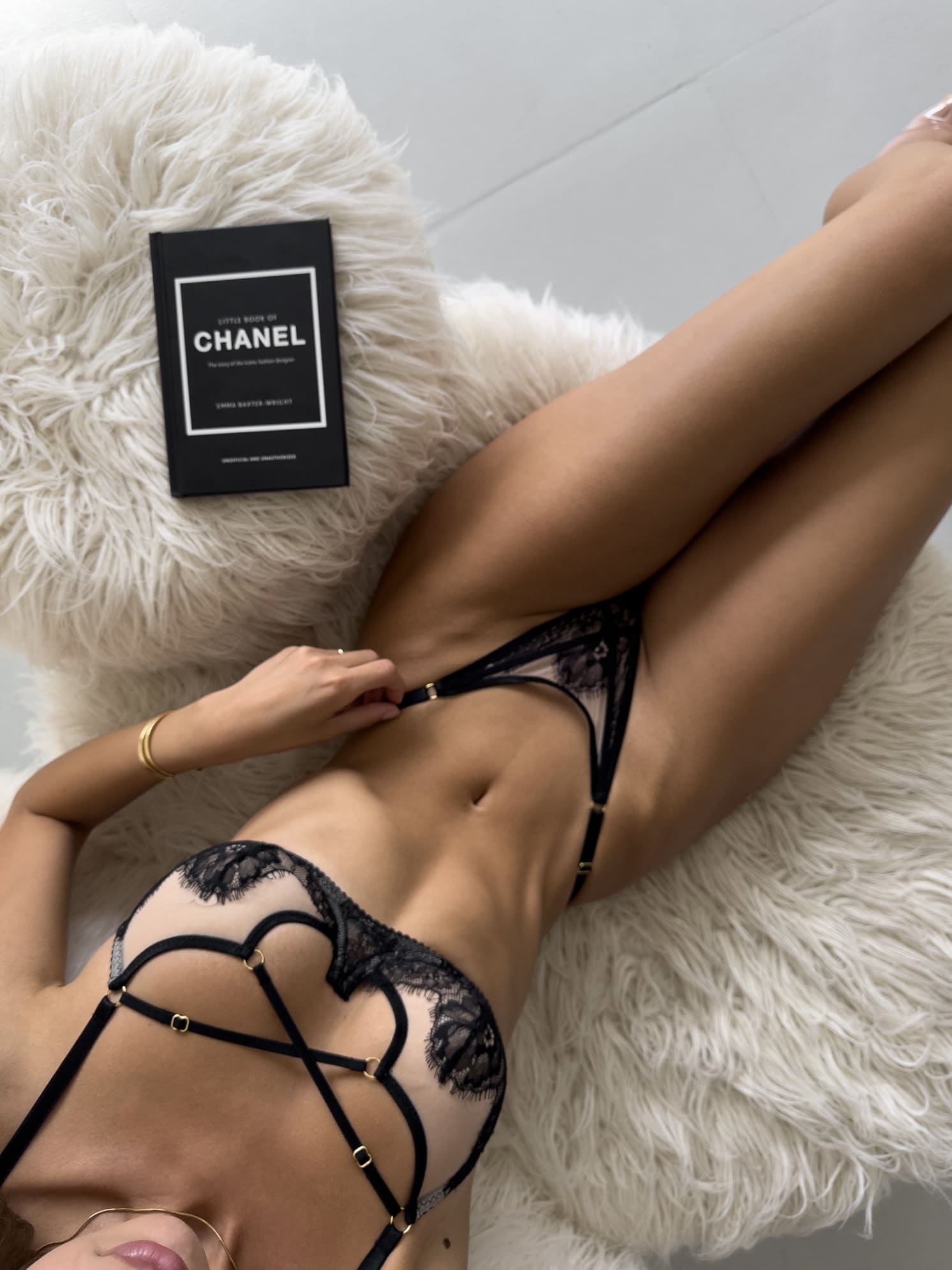 Dramatic Black Swan noir lace lingerie set with architectural mesh detailing.