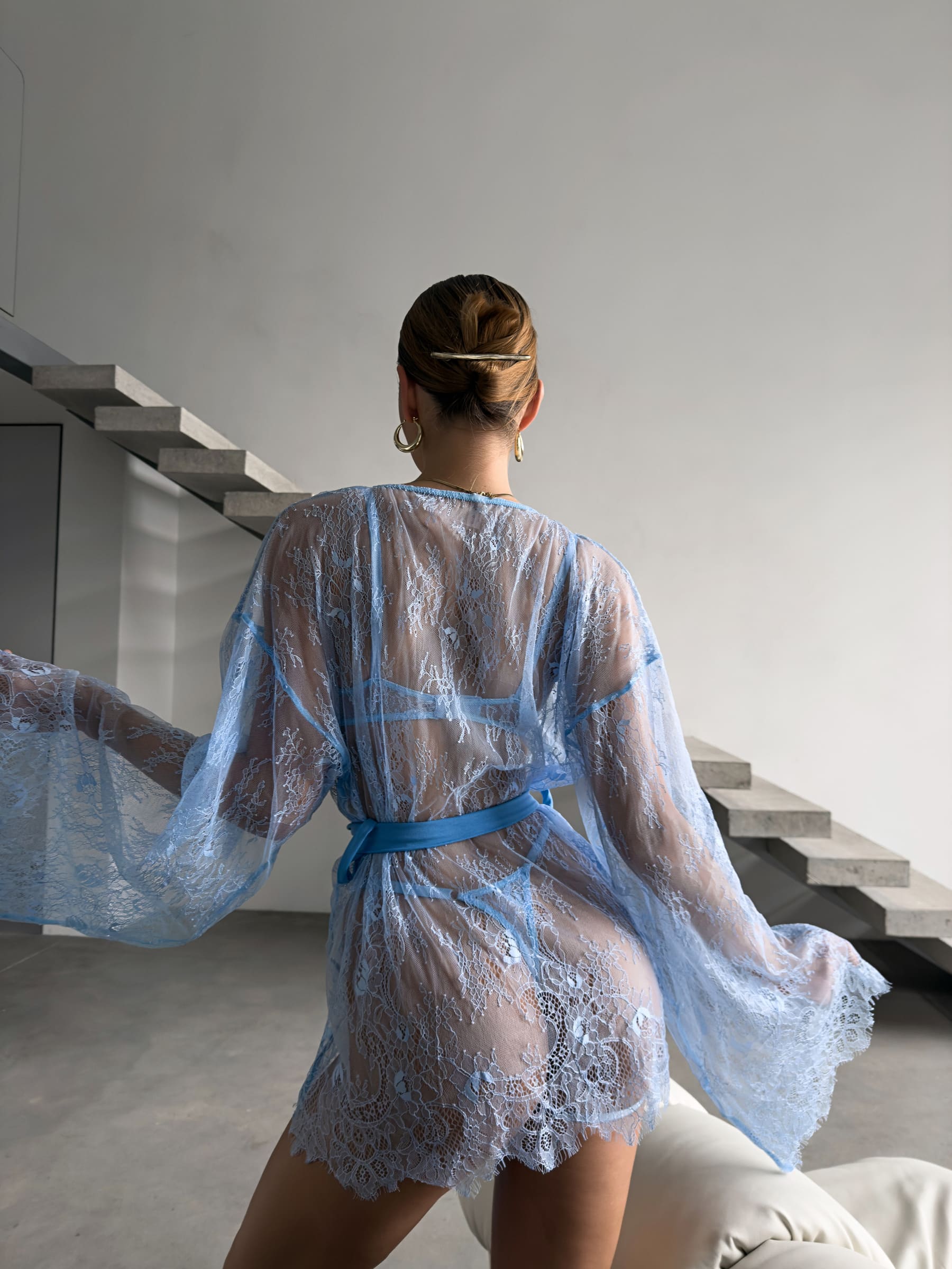 Handcrafted blue lace Femme Totale set featuring a luxury robe, bra, and panties.