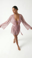 Handcrafted pink lace Femme Totale set featuring a luxury robe, bra, and panties.