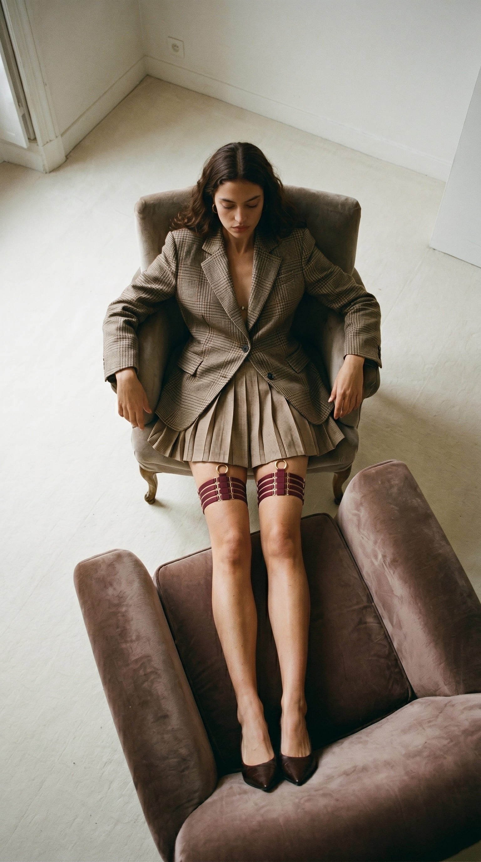 Architectural bordeaux lingerie elastic garter from the Quartet collection.