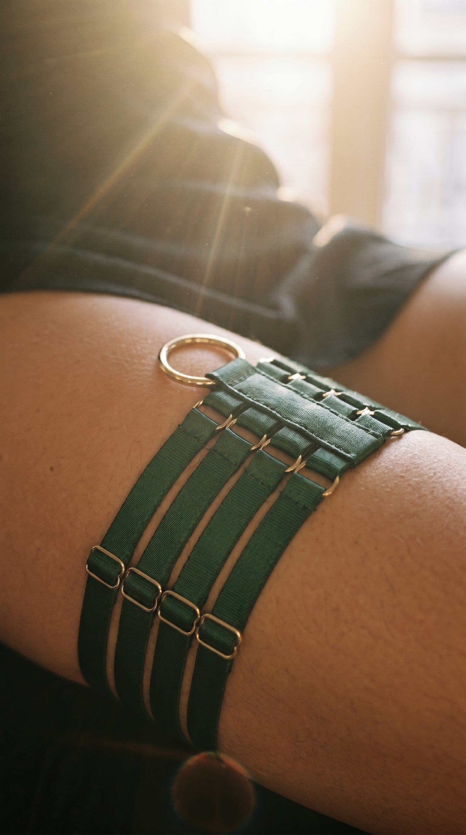Architectural green lingerie elastic garter from the Quartet collection.