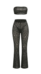 Bespoke black Goddess Aura lace suit with flared pants and bandeau top.