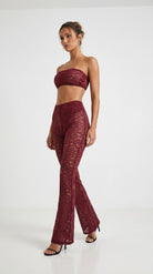 Handcrafted red floral lace jumpsuit from the Goddess Aura collection.