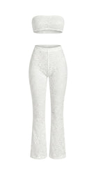 Bespoke white Goddess Aura lace suit with flared pants and bandeau top.
