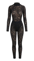 Bespoke black floral lace suit with a high-neck design for an architectural second-skin fit.