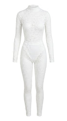 Handcrafted white lace jumpsuit from the Iness de Nuit collection tailored to unique metrics.