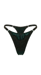 Detailed view of vibrant green embroidery and translucent mesh on the Jia set.