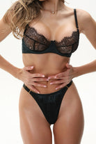 Handcrafted emerald lace bra and matching panties from the Jia artisanal collection.
