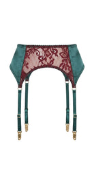Product shot of the Kleo emerald garter belt with burgundy lace overlay on a white background, showing the floral lace paneling and gold clip hardware.