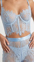 Lace Poetry blue sheer lace bodysuit front view showing intricate floral lace details