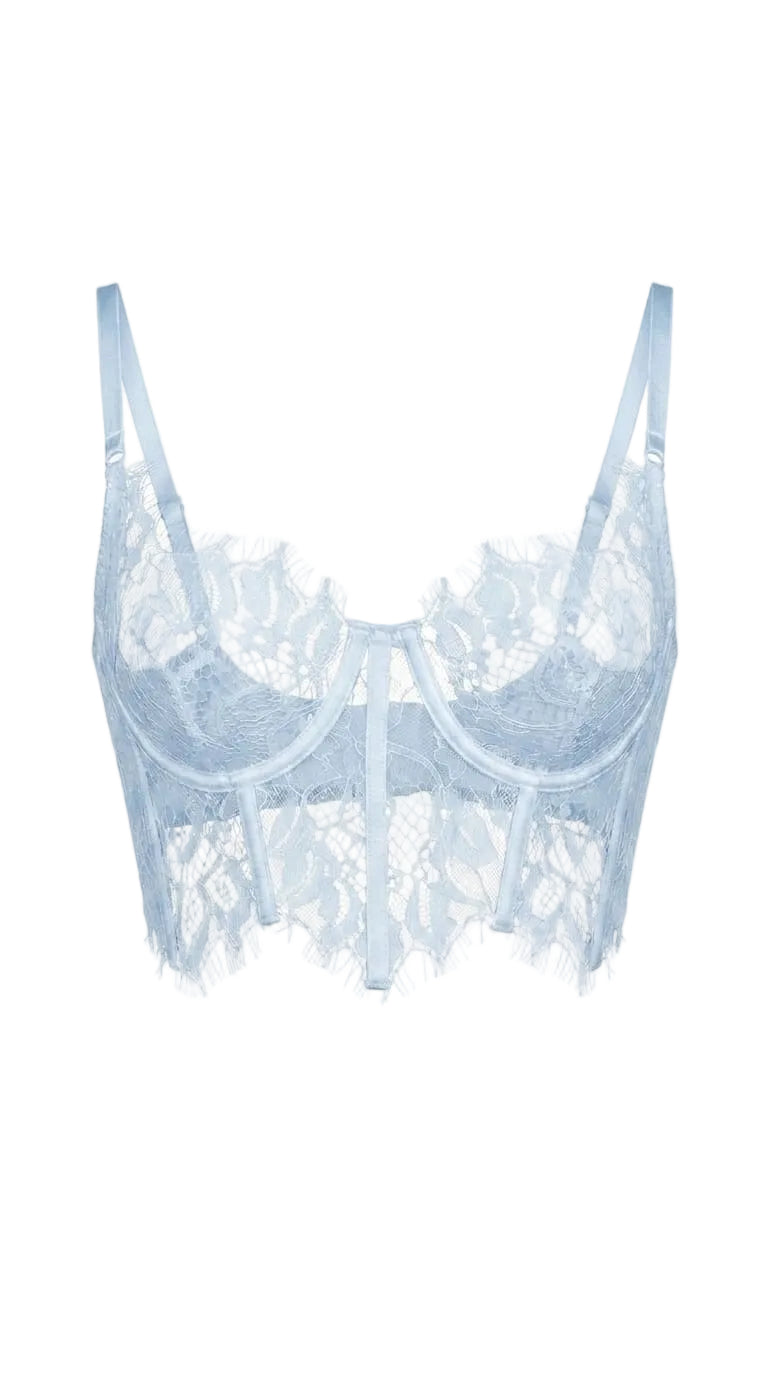 Close-up of the delicate lace stitching and adjustable straps on the blue bodysuit