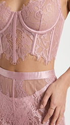 Back view of the elegant custom-fit pink lace pants