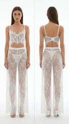 Studio presentation of the handmade white lace sheer bodysuit