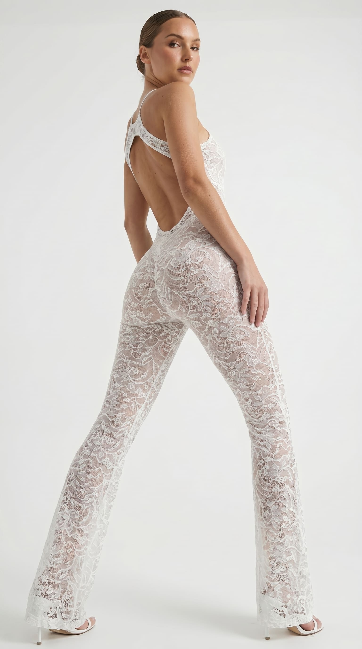 Video showcase of the white Lea De Paris lace suit.