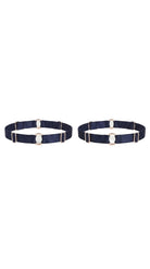 Bespoke navy leg garter with gold-plated hardware and adjustable straps.