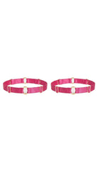 Bespoke pink leg garter with gold-plated hardware and adjustable straps.