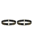 Handcrafted black leg garter featuring signature gold-plated rings.