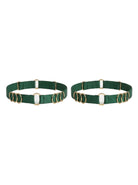 Handcrafted green leg garter featuring signature gold-plated rings.