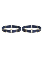 Handcrafted navy leg garter featuring signature gold-plated rings.