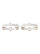 Handcrafted white leg garter featuring signature gold-plated rings.