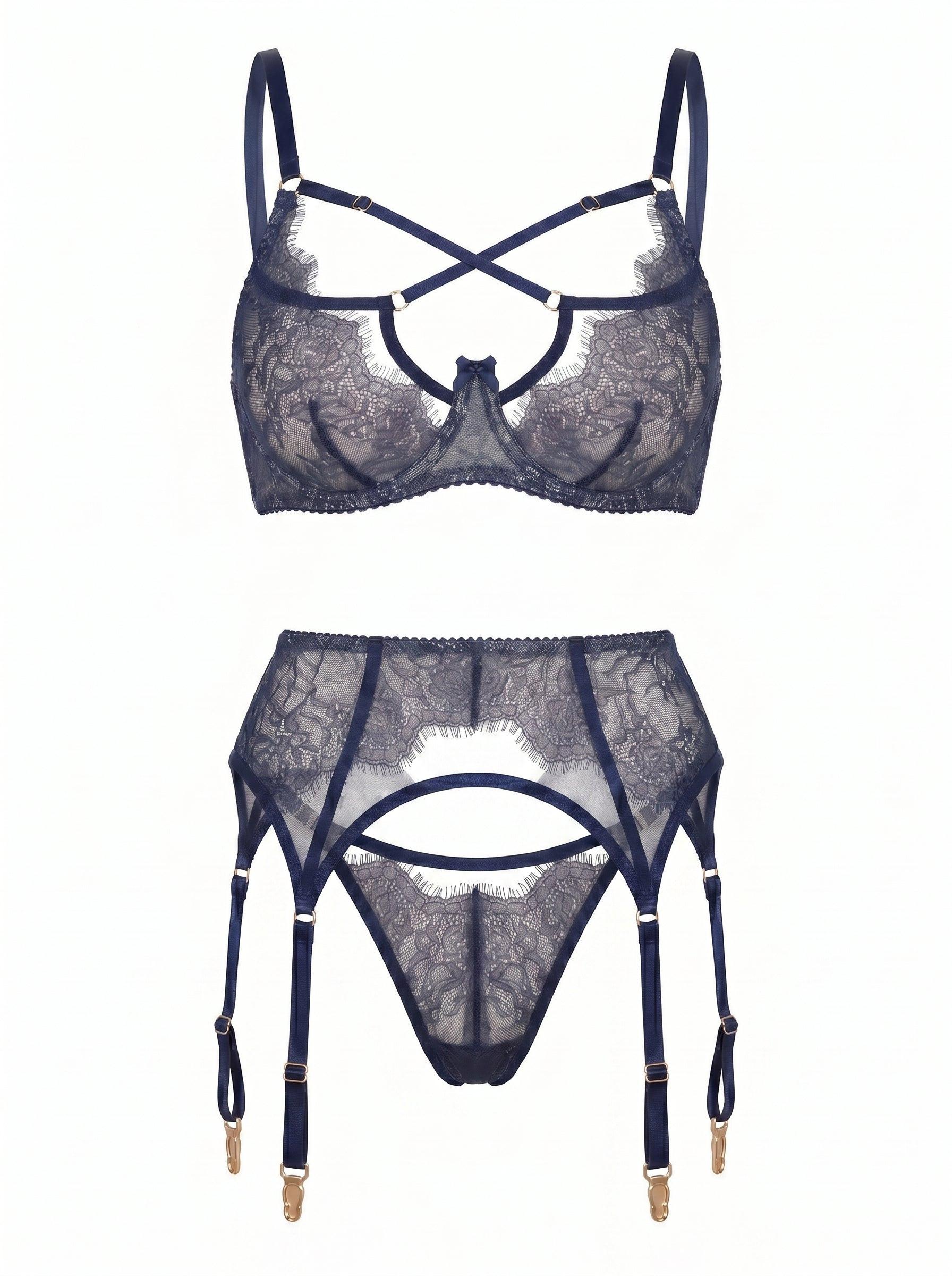 Front view of Odri Blue navy lace lingerie set featuring strappy bra, panties, and garter belt.