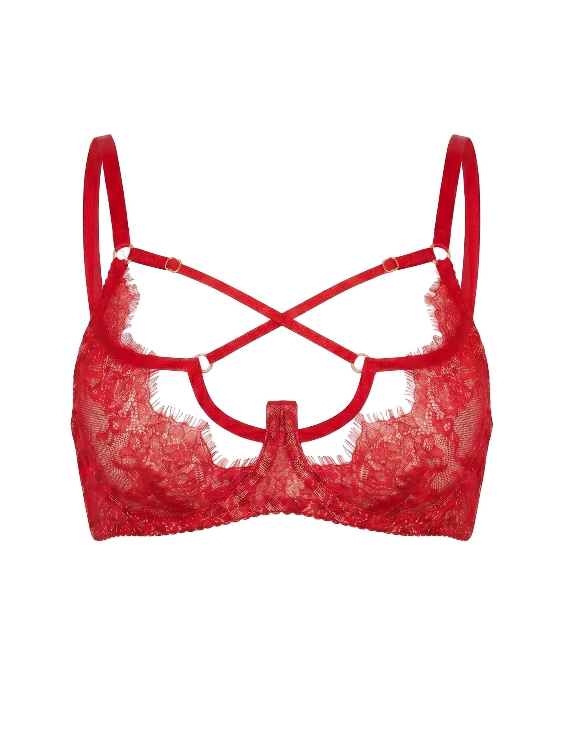Close-up view of the Odri Red strappy bra featuring red Chantilly lace and architectural neckline accents.