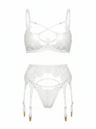 Front view of Odri White 3-piece lingerie set featuring white Chantilly lace, strappy bra, and garter belt.