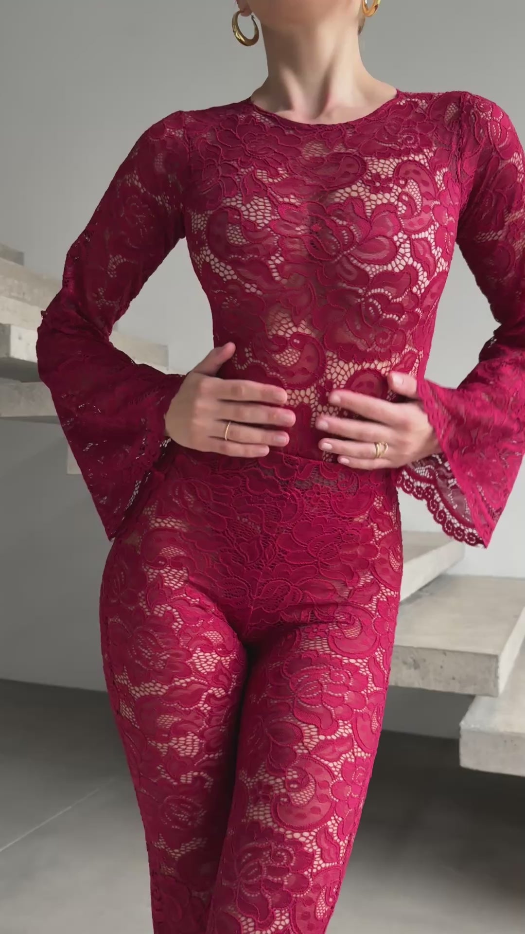 Precision-tailored red lace jumpsuit video from the Amalia Empress collection.