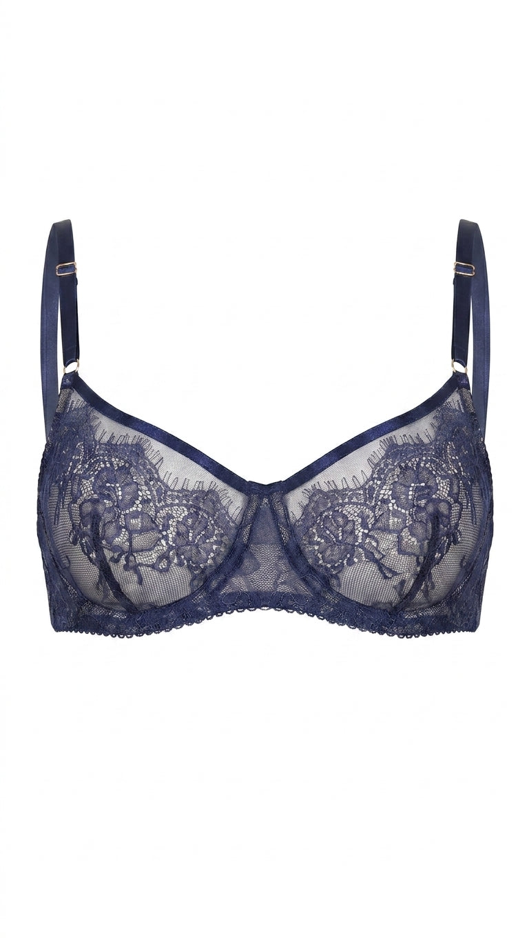 Sapphire blue lace bra featuring architectural mesh panels and custom tailoring for a flawless fit.