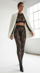 Handcrafted black floral lace jumpsuit designed for a second-skin fit.
