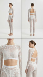 Detailed view of artisanal lace embroidery on the white Sensual Edge suit.